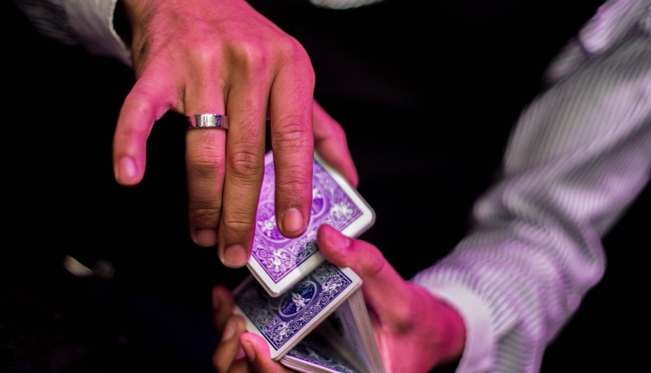 Magician performing on Thames river cruise