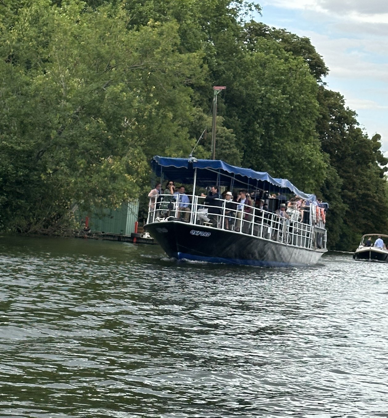 Guests enjoying Henley Regatta from boat