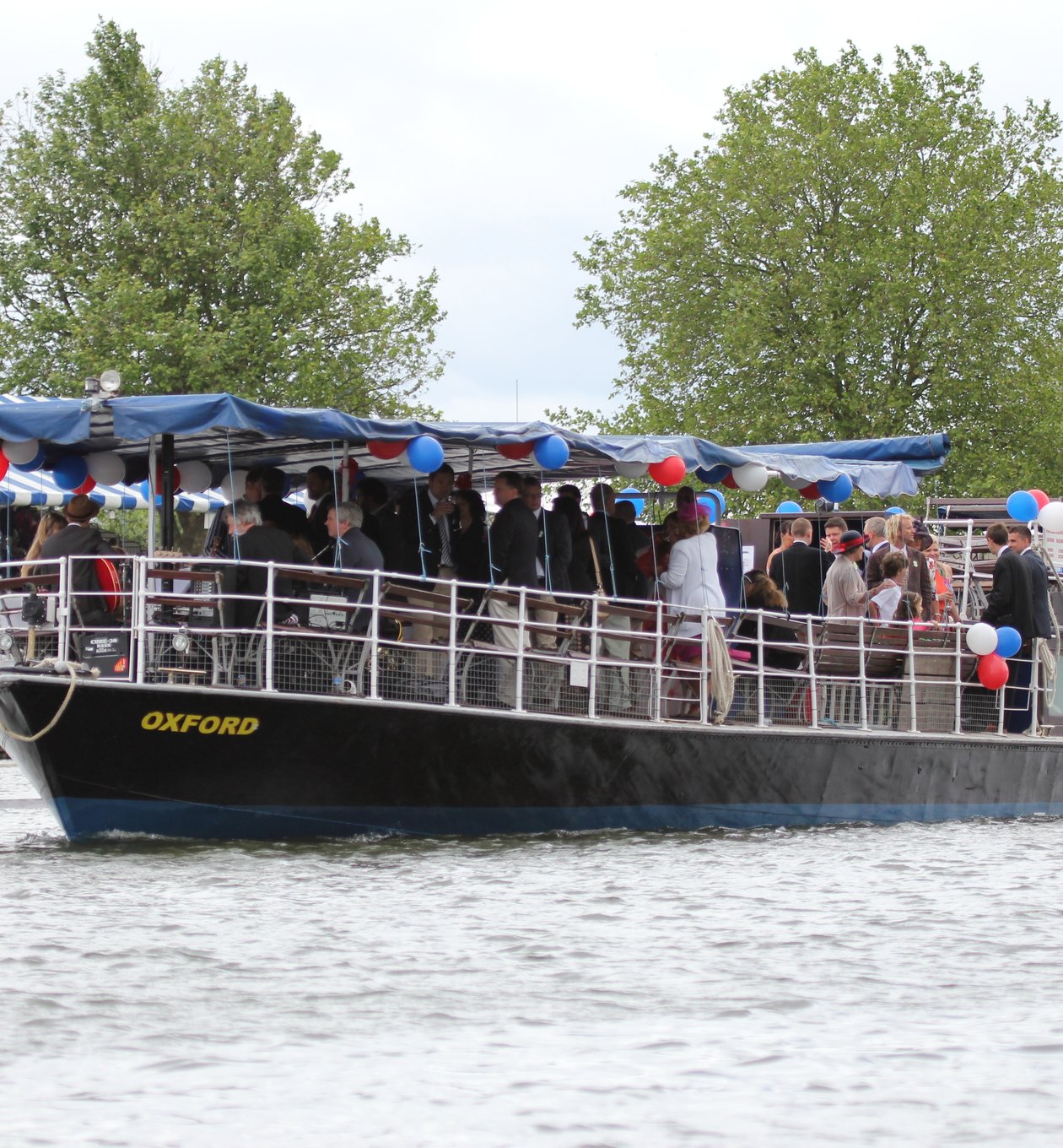 View of the Henley Royal Regatta course from a boat on the River Thames